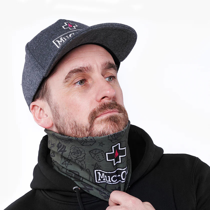 Muc-Off Neck Gaiter worn on cyclist punk green