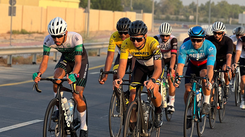 Cyclists riding during the summer