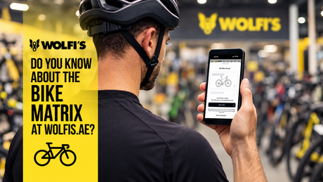  Cyclist using Wolfi's Bike Matrix tool on a smartphone to find compatible bike parts