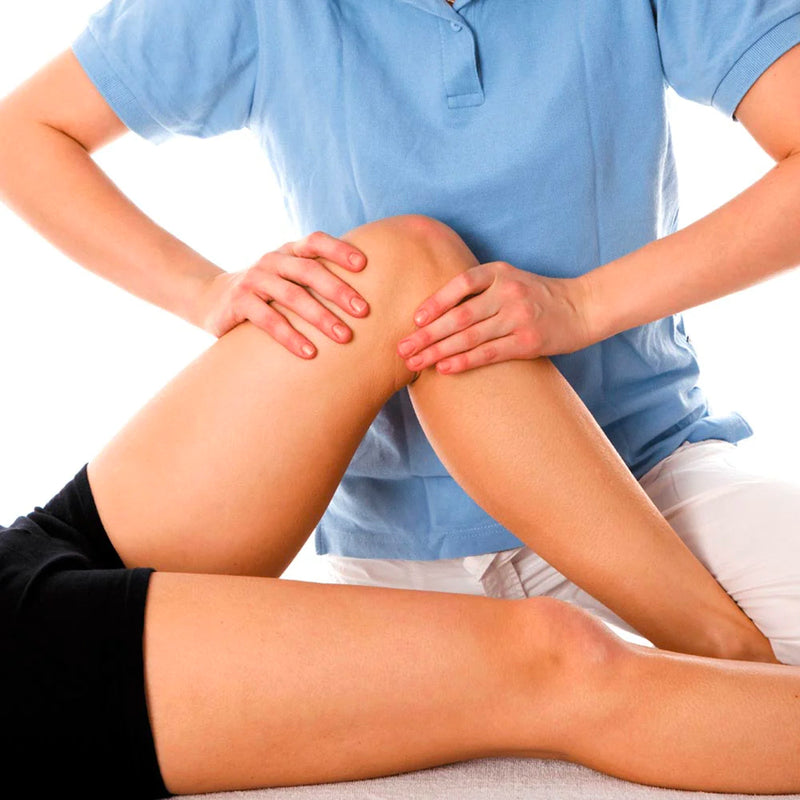 Skilled soft tissue therapy session, with a therapist applying specialized techniques to alleviate muscle tension and promote healing